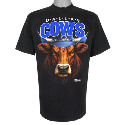 Dallas Cows parody t-shirt inspired by Dallas football culture, featuring original cow artwork on a Vintage Black garment.