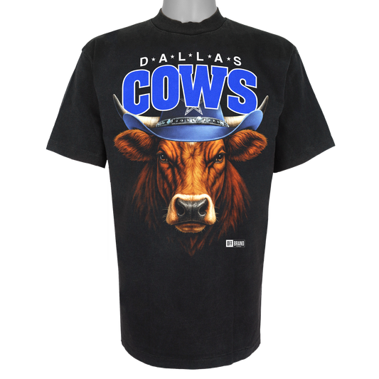 Dallas Cows parody t-shirt inspired by Dallas football culture, featuring original cow artwork on a Vintage Black garment.
