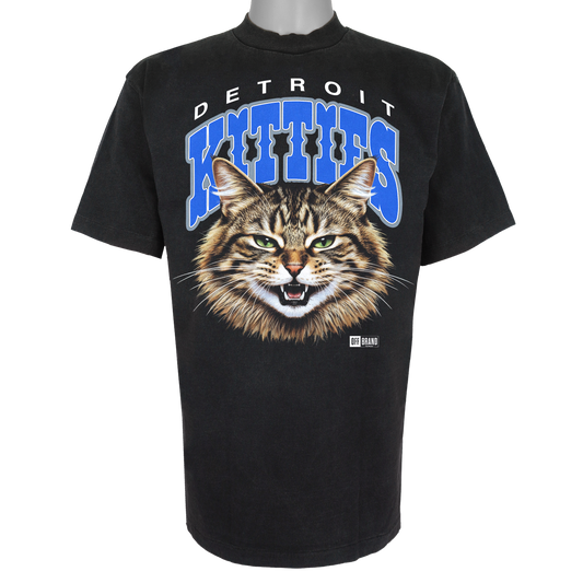Detroit Kitties parody t-shirt inspired by Detroit Lions football culture, featuring original cat artwork on a Vintage Black garment.