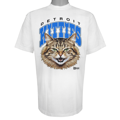 Detroit Kitties parody t-shirt inspired by Detroit Lions football culture, featuring original cat artwork on a Vintage White garment.