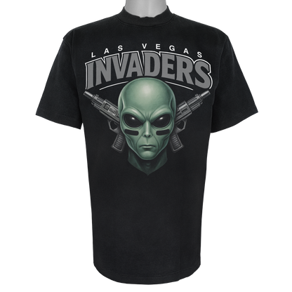 Las Vegas Invaders parody t-shirt inspired by Las Vegas football culture, featuring original alien invader artwork on a Vintage Black garment.