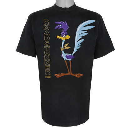 Roadstunner t-shirt featuring a stylized purple and blue bird with a gold bandana and vertical gold lettering on a Vintage Black tee.